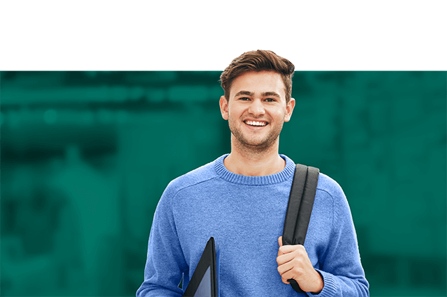 Male student smiling at the camera